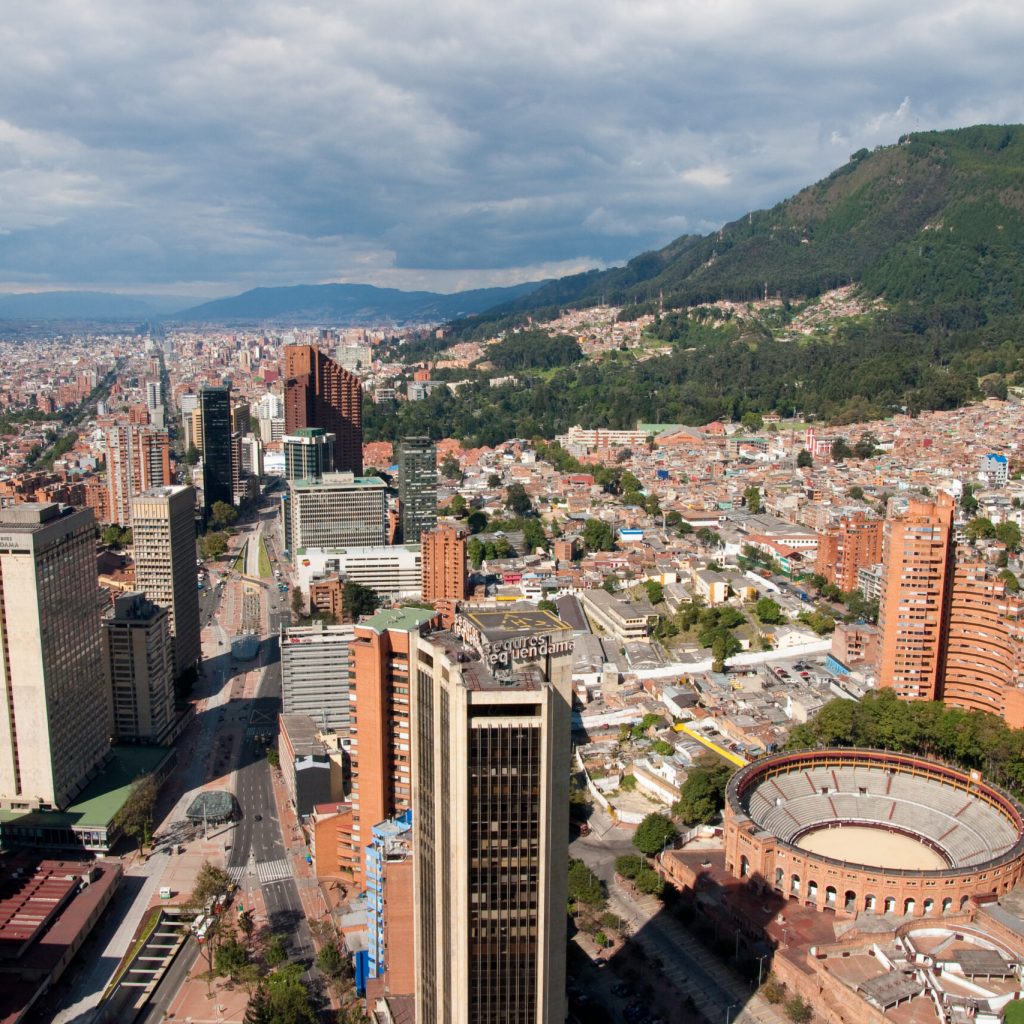 Bogota, Colombia - February 2, 2014: View of sunny Bogota center with the Santamaria bullring and the Andes mountains in the background